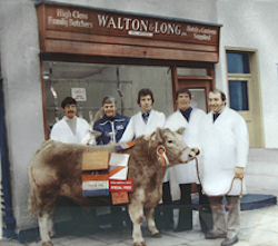 1947 in Hickley, four brothers and cow infront of Walton & Long butchery